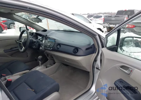 2010 Honda Insight Lx z USA, uszkodzony, nr VIN JHMZE2H57AS002126